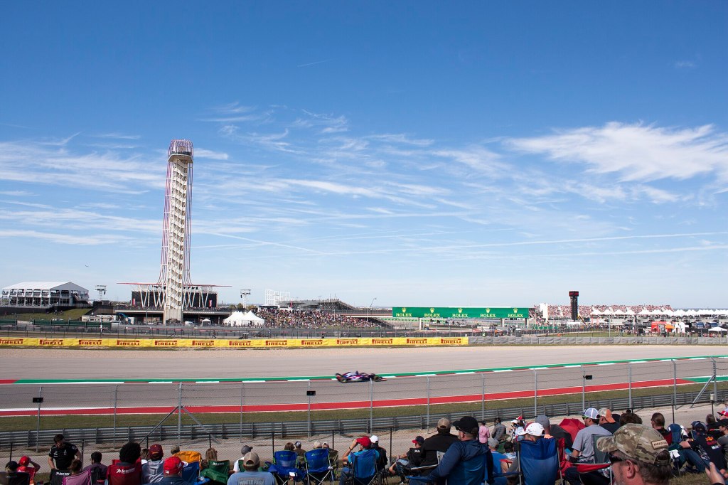 Formula 1 cars racing at the Circuit of the Americas during the 2018 US Grand Prix