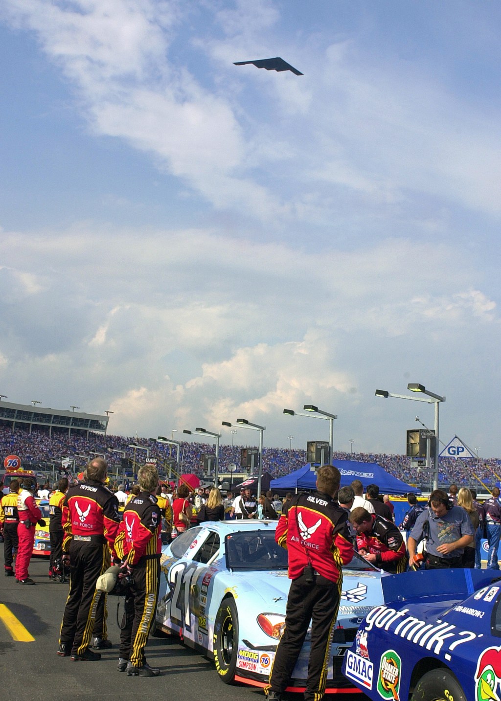 Military aircraft fly over Charlotte Motor Speedway before the Coca-Cola 600 in 2003