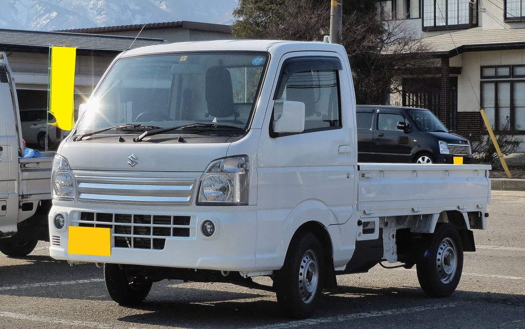 A Suzuki Carry KX 4WD kei truck, the kind of tiny Japanese pickup Americans are importing