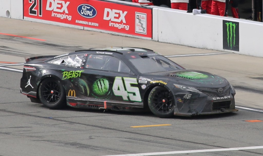 Tyler Reddick's No. 45 Toyota Camry NASCAR Cup car on track at Auto Club Speedway in 2023